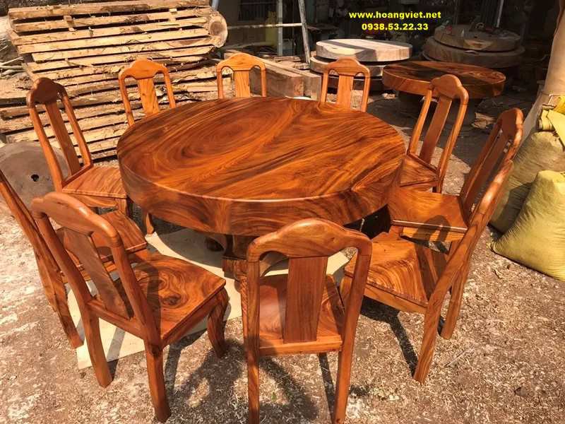 Mẫu bàn ăn tròn 10 ghế gỗ tự nhiên nguyên khối đẹp.