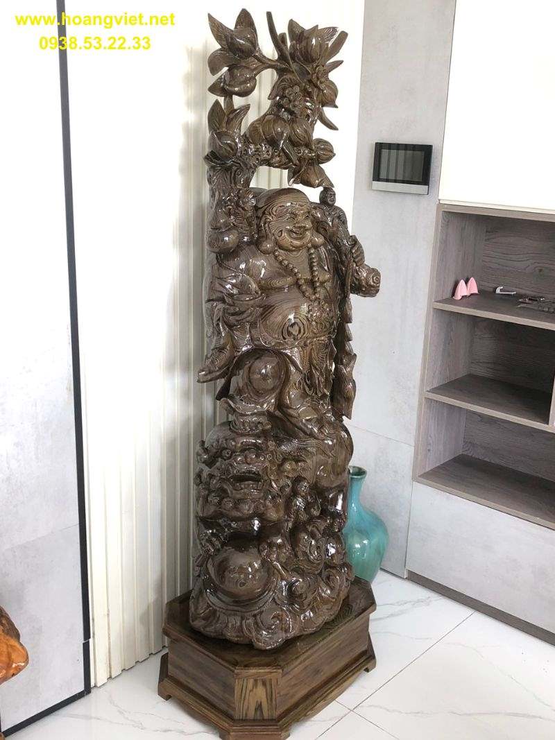 Tượng phật di lạc gỗ thủy tùng đứng lân Tượng phật di lạc gỗ thủy tùng đứng lân