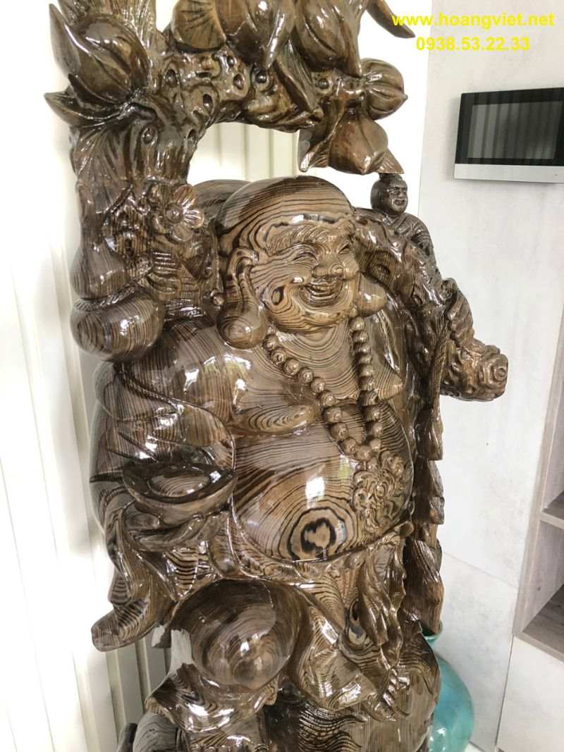Tượng phật di lạc gỗ thủy tùng đứng lân Tượng phật di lạc gỗ thủy tùng đứng lân