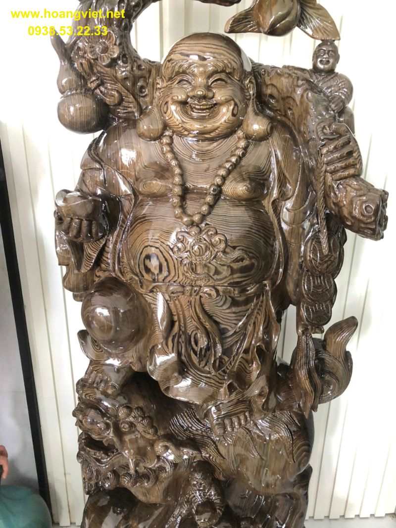 Tượng phật di lạc gỗ thủy tùng đứng lân Tượng phật di lạc gỗ thủy tùng đứng lân